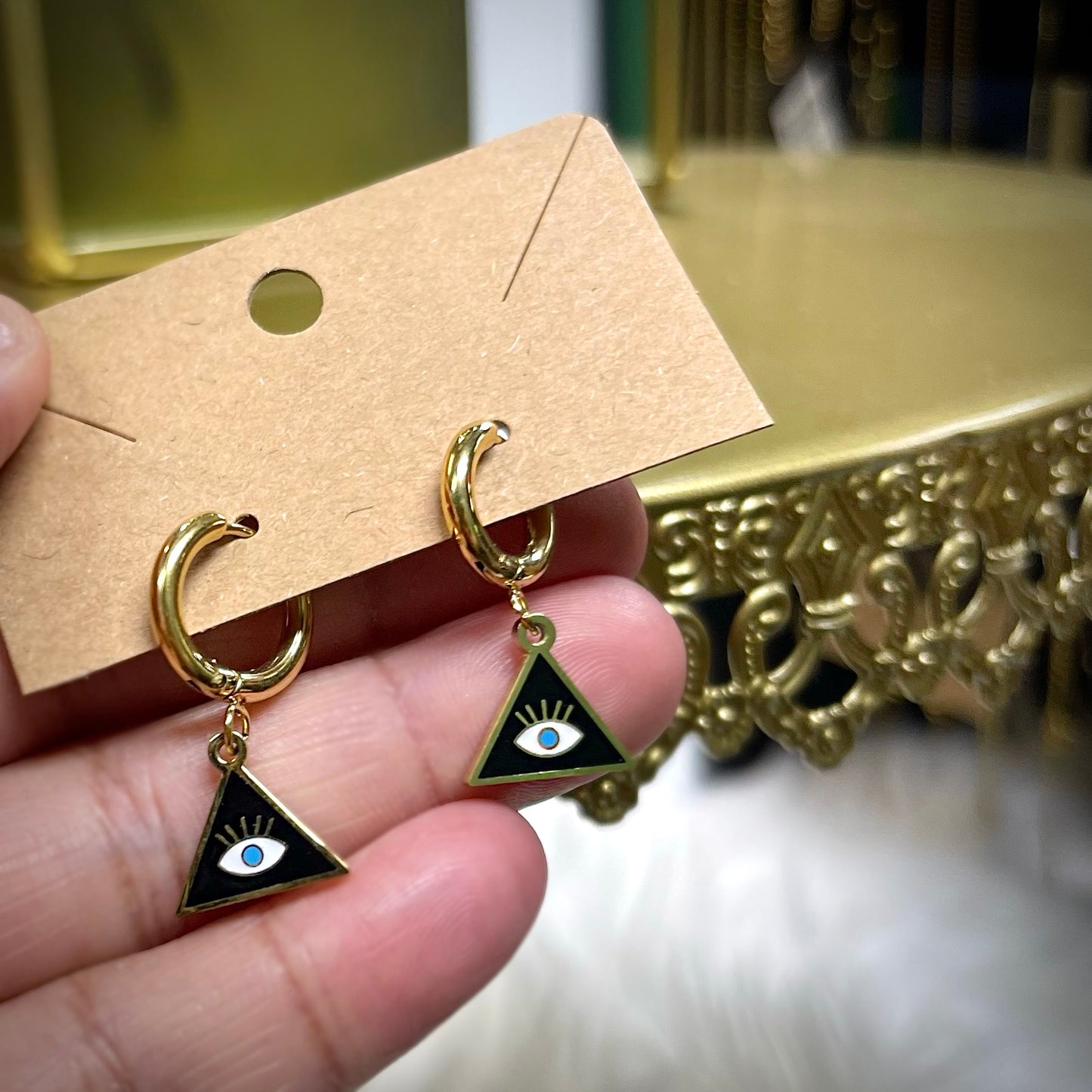 Eye triangle earrings